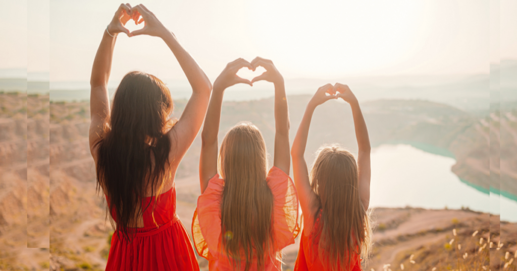 3 Sisters Doing Heart Hands